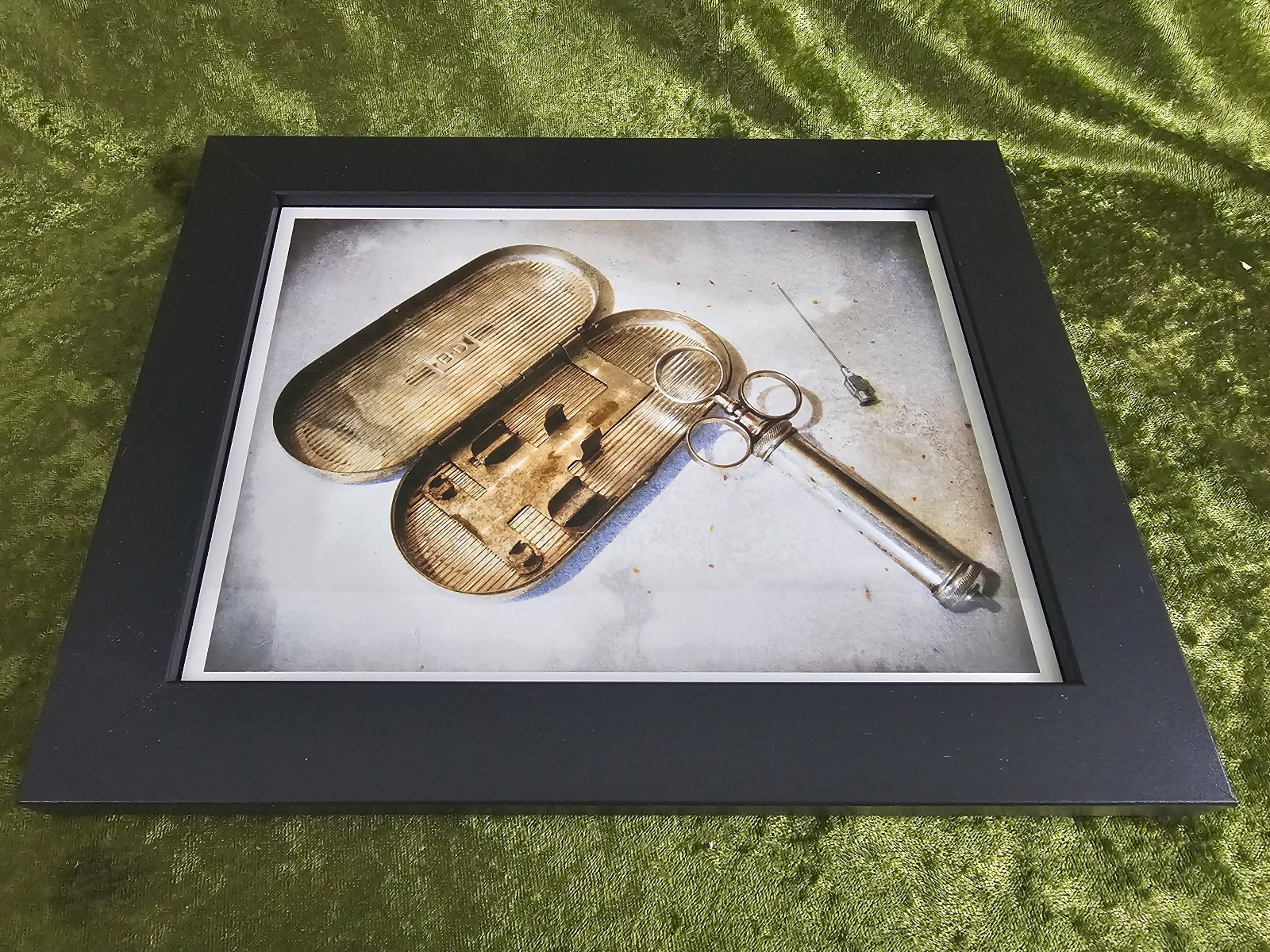 Framed Print of a Syringe taken off of the wall of an Embalming Room funeral