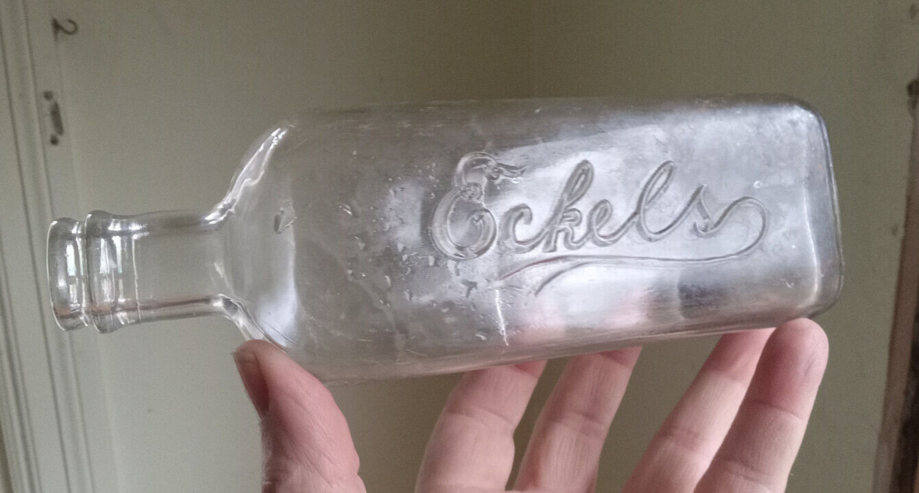 ECKELS EMBALMING FLUID BOTTLE WITH MEASUREMENTS USED BY UNDERTAKER FOR DEAD BODY