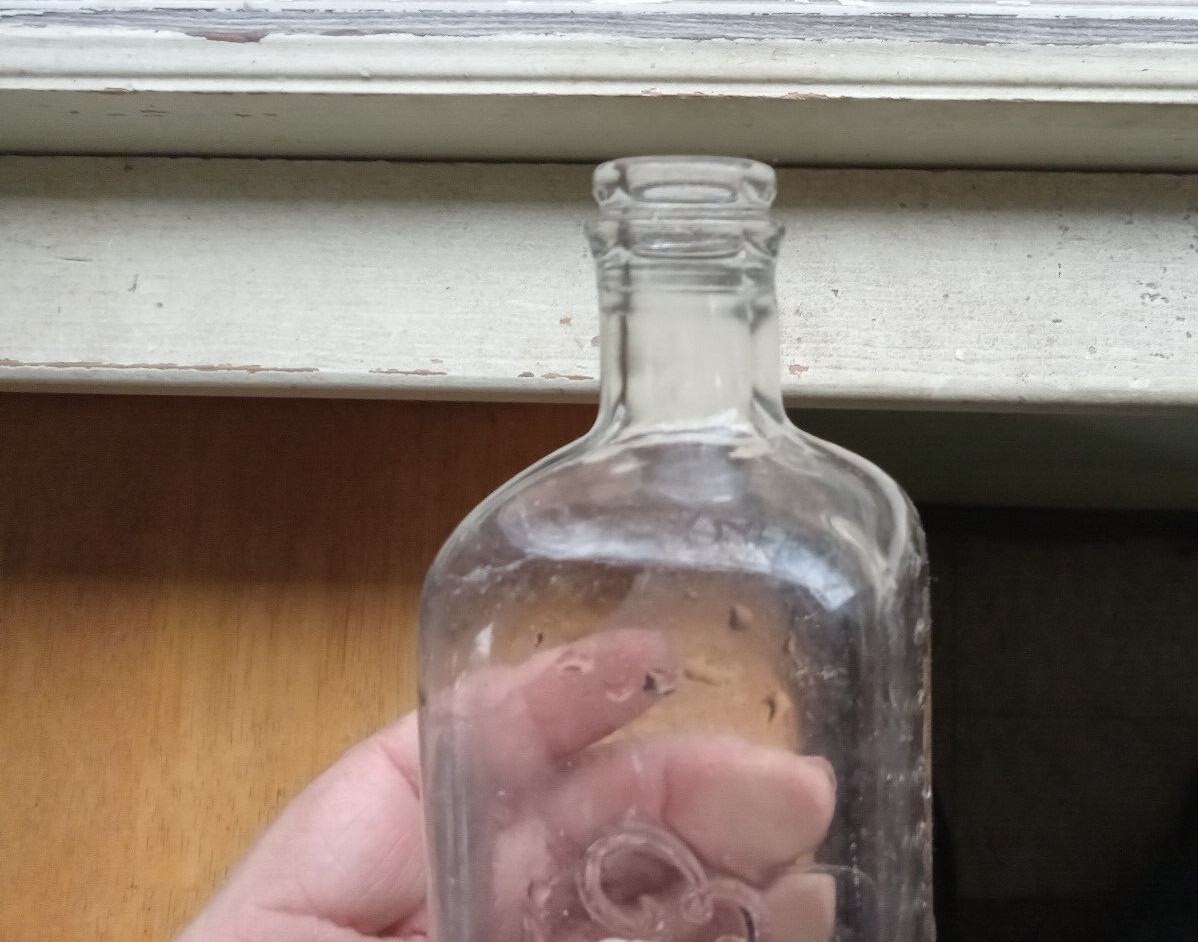 ECKELS EMBALMING FLUID BOTTLE WITH MEASUREMENTS USED BY UNDERTAKER FOR DEAD BODY